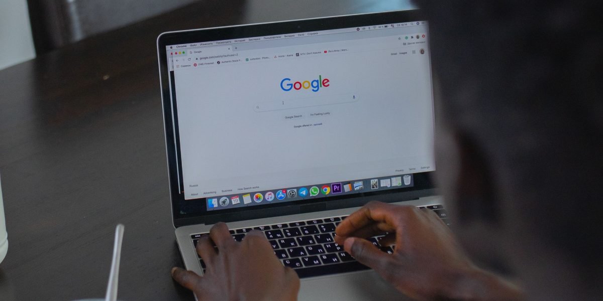 A person using a tablet or laptop to search for local mental health resources, reflecting the process of finding MHA affiliates.