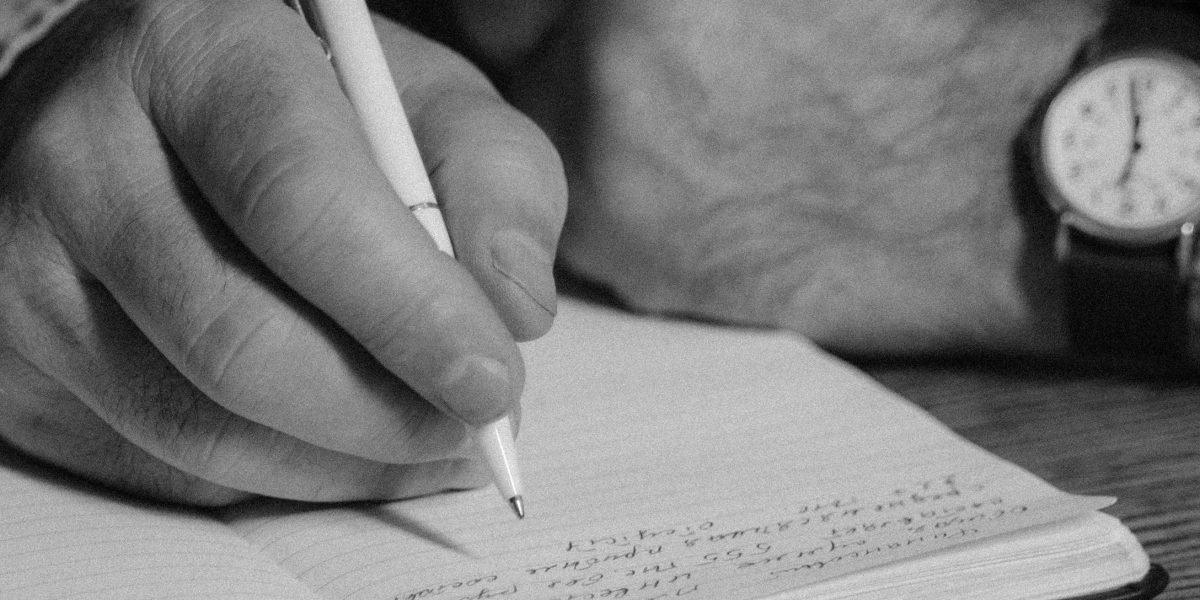 A writer thoughtfully planning the narrative elements of a children's book, focusing on plot, character, and voice.