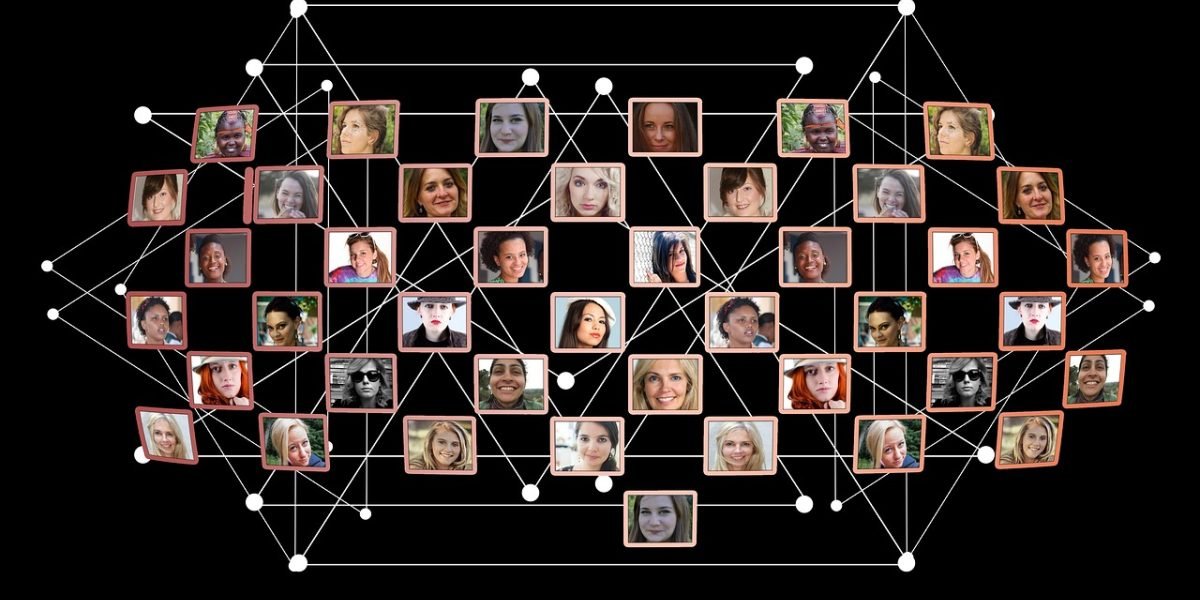 A diverse group of people collaborating, representing the global reach and universal appeal of 'The Alchemist' across cultures.