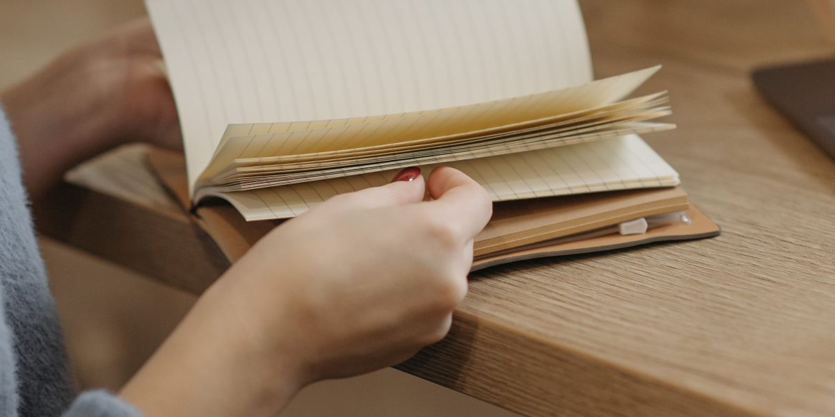Experience a peaceful break from daily worries by slowing down to read and write in a personal journal.