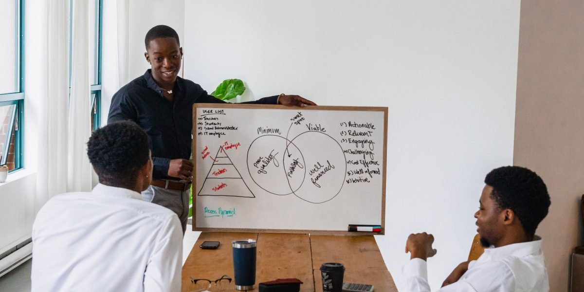 A group of people actively collaborating, representing community building and shared engagement.